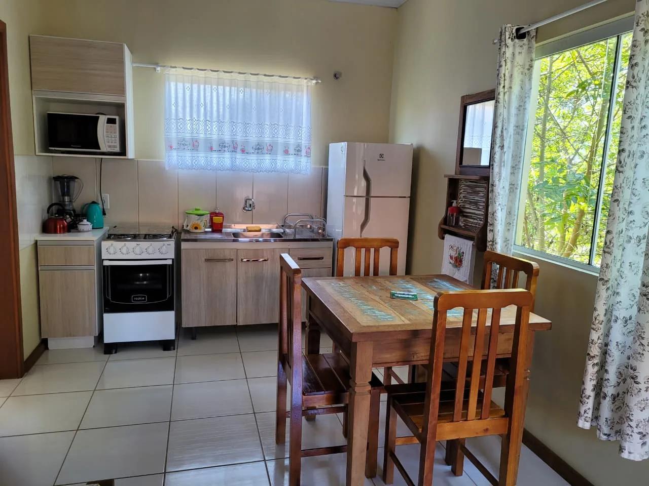 Foto 2 — TG51 - Apartamentos em espaço arborizado e tranquilo
